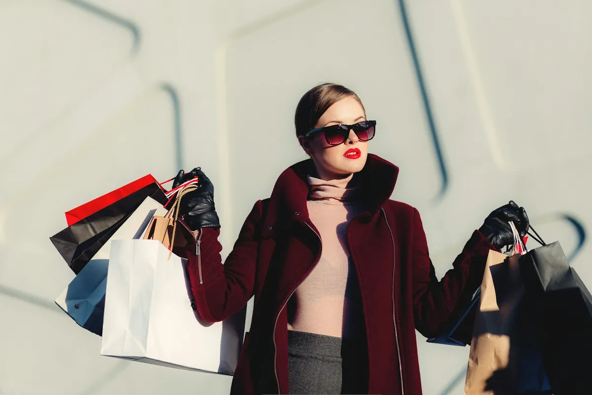 Editorial fashion scene in a bright clothing store
